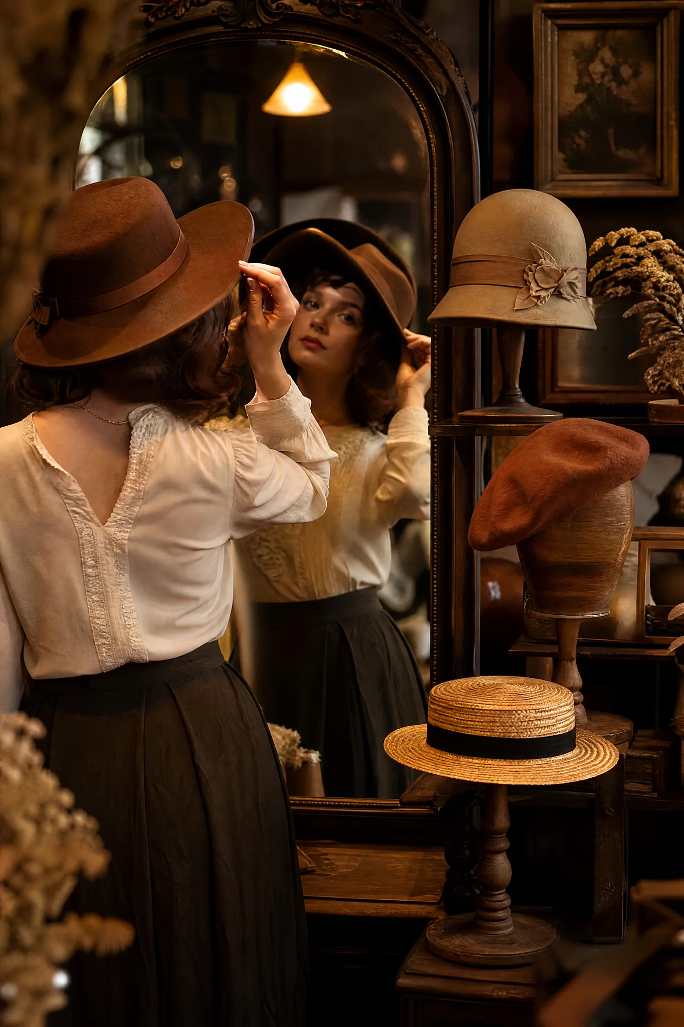 Grok Imagine Image: Trying Options Woman trying a wide-brimmed hat in a milliner's mirror with other hat styles on display behind