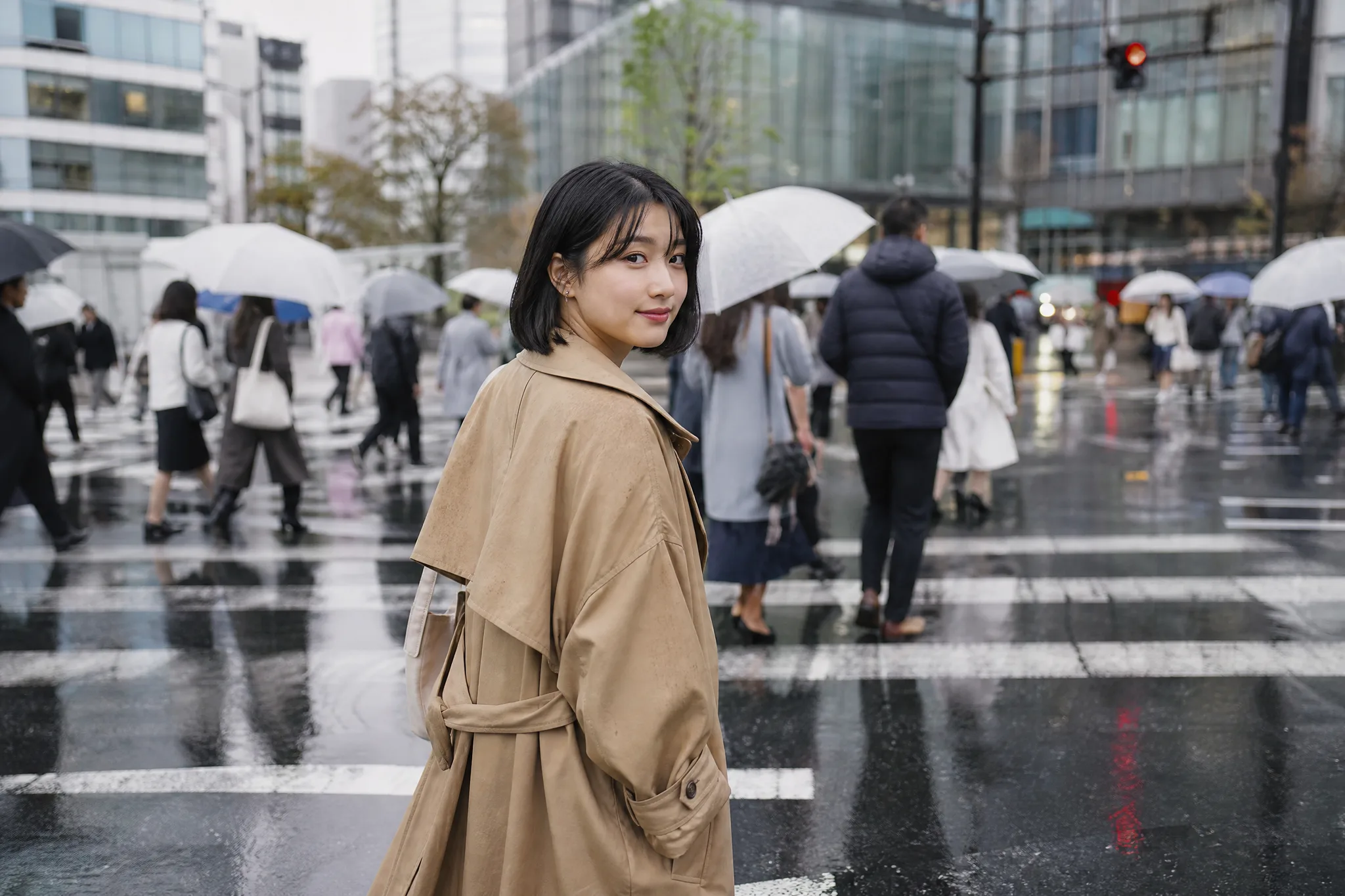 Woman in a camel trench coat looks back on a rain-wet city crosswalk, a starting frame for image to video