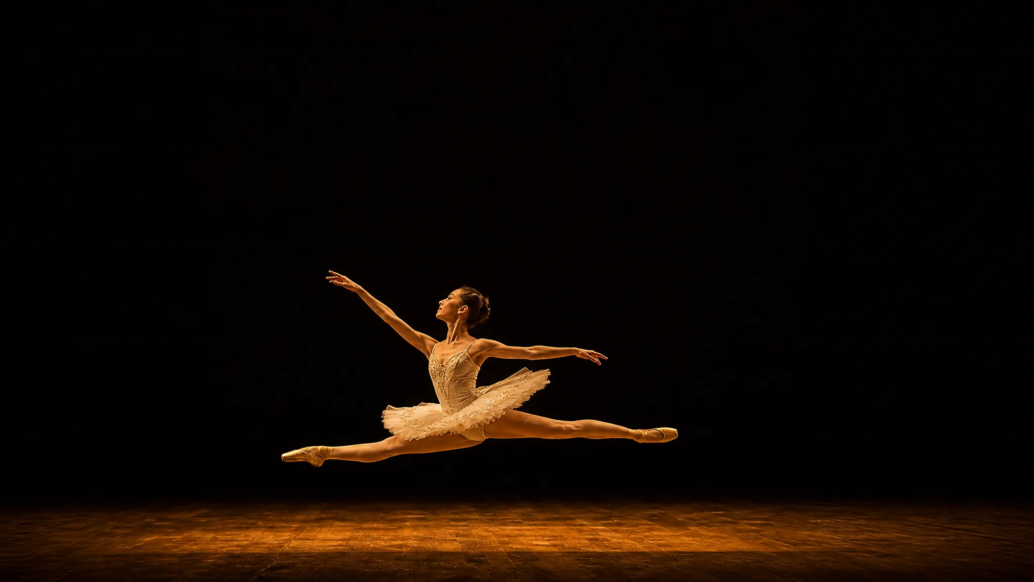 Seedream 5: Stage Photo with Headline Room Ballet dancer leaping across the lower third of a bare stage with dark open space above